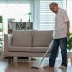 Elderly cleaning the home